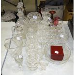 A collection of glassware, including decanters, bowls, six cut-glass wine glasses and other drinking