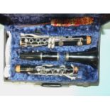 A Boosey & Hawkes Regent clarinet, 26½'' approximately, no. 296360, in fitted case, with clarinet