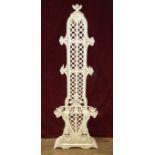A Victorian white-painted cast iron hall stand, the back with lattice decoration above a double