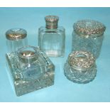 Three silver-mounted cut-glass trinket pots, a scent bottle with plated top and a silver-mounted