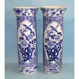 A large pair of 19th century Chinese porcelain blue and white sleeve vases decorated with panels