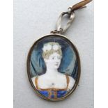 A 19th century oval bust length portrait miniature of a young woman in a blue and gold trimmed dress