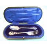 A cased silver christening set of a spoon and fork, Sheffield 1915.
