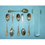 A set of six silver teaspoons, Chester 1893 and a pair of bright-cut sugar tongs, London 1802, maker