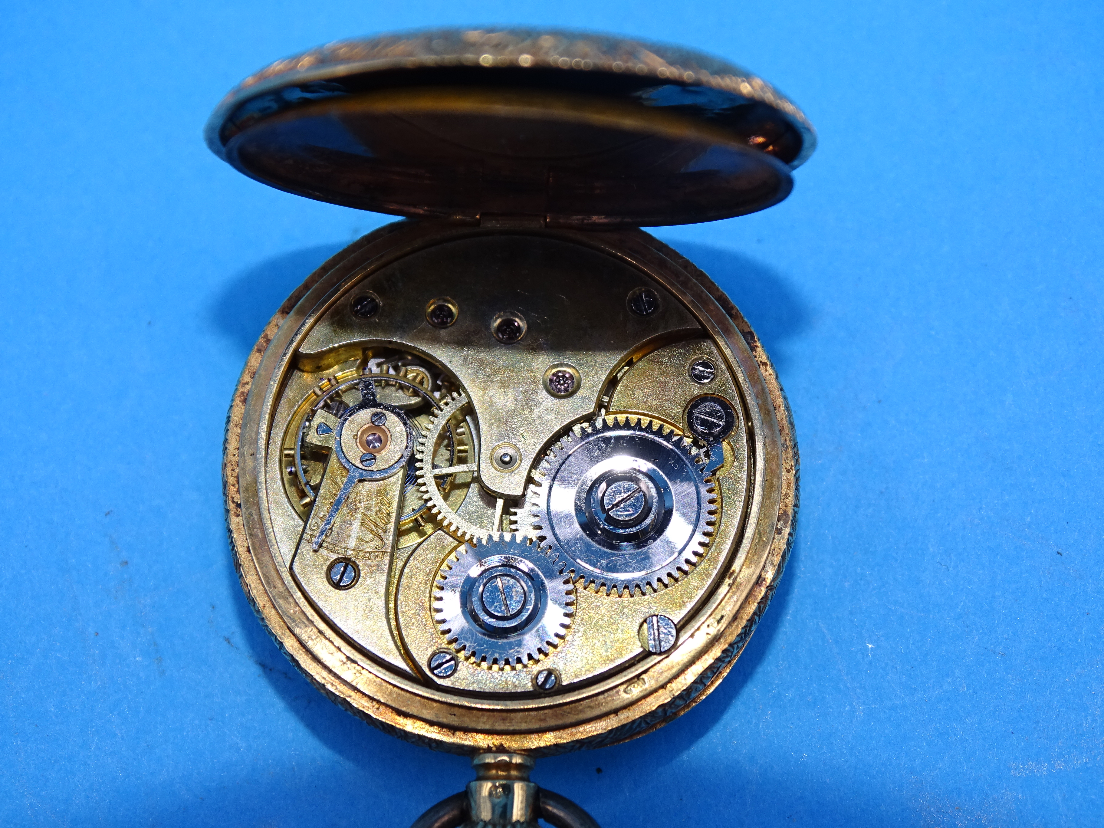 A ladies 18ct gold-cased open-face pocket watch, the engraved gilt dial within floral-engraved case, - Bild 3 aus 3