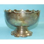 A silver circular rose bowl with shaped rim and foot, Birmingham hallmark, date mark rubbed, 20.