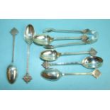A set of six Victorian silver teaspoons and matching tongs, the terminals decorated with rondels