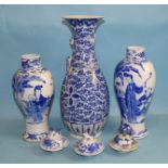 A 19th century Chinese blue and white porcelain vase decorated with flowering lotus, applied