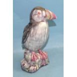 A Beswick blue-gloss-glazed model of a puffin on a rock, impressed factory mark and no.618, 24cm