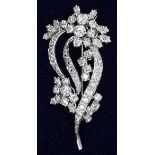 A diamond floral spray brooch claw-set brilliant and marquise-cut diamonds in white gold mount, (
