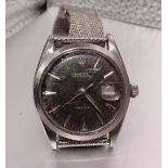 Rolex, a gentleman's Rolex Oysterdate Precision wristwatch, the black dial with dart and baton