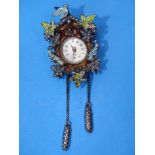 A French novelty brooch watch in the form of a cuckoo clock, with enamelled 835 silver case set
