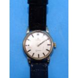 Omega, a lady's 9ct-gold-cased wrist watch, the silvered face with baton numerals over Cal 244