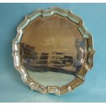 A modern Chippendale-style silver salver on three tab feet by Asprey, 22cm diameter, ___12oz,