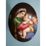 A good 19th century German porcelain oval plaque painted with mother and children, 17 x 12cm.