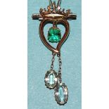 A 9ct gold emerald and aquamarine brooch/pendant, the crowned witch's heart with claw-set emerald