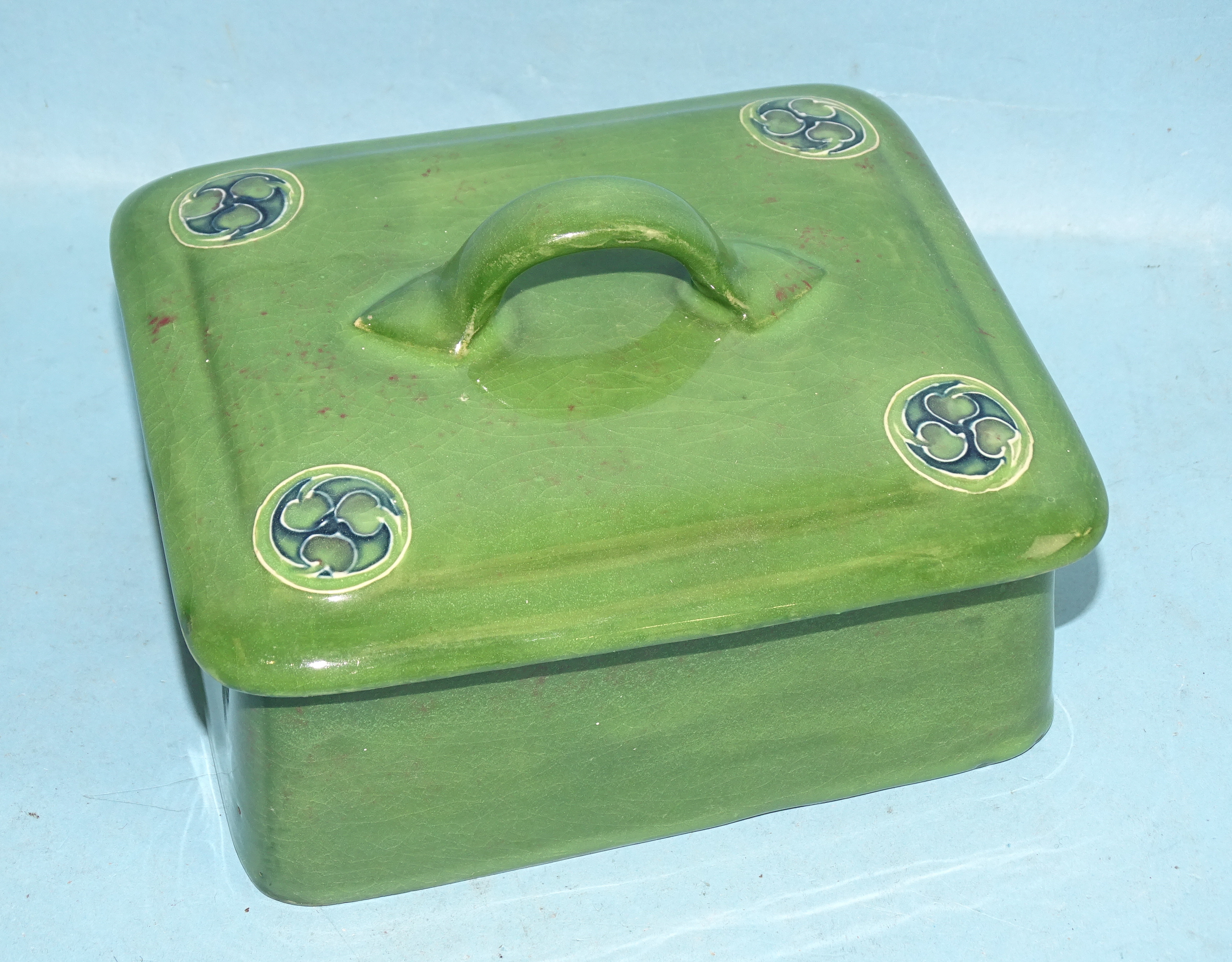 A Moorcroft for Liberty & Co. flamminian ware green-glazed rectangular box and cover, with handle