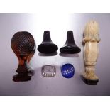 A collection of hardstone seals, to include an agate with lattice intaglio, a jet fob seal with