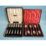 A cased set of six silver teaspoons, Sheffield 1901 and a cased set of six silver cake forks,