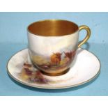 A small Royal Worcester cup and saucer painted with Highland cattle in a moorland setting, with gilt