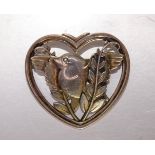 Georg Jensen, a silver brooch designed by Arno Malinowski, of heart shape with a bird perched in
