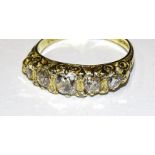 A Victorian-style five-stone diamond ring claw-set five graduated old brilliant-cut diamonds, with