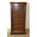 A late Victorian mahogany Wellington chest, fitted with eight drawers, 59cm wide, 124.5cm high, 39cm