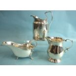 A small baluster-shaped silver cream jug, London 1928, a plain sauce boat, Birmingham 1964 and a