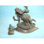 A bronze figure of Ganesha, on plinth base, 19cm high, 21cm wide and a small Ganesha figure, 8cm