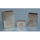 A Chinese silver rectangular matchbox holder with embossed flower and butterfly decoration, 6 x 4cm,