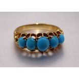 A Victorian gold ring claw-set five graduated turquoise stones, unmarked, (tests as 18ct), size M,