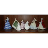 Four Royal Doulton figurines: 'Rachel' HN2936, 'Fair Lady' HN2193, 'Wisdom' HN4083, 'Melody' HN4117,