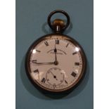 An engine turned silver case keyless pocket watch, white enamel dial with Roman numerals and seconds