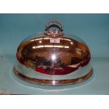A Walker & Hall silver plated domed meat dish cover 36.5cm long, 24.5cm high, engraved family crest.