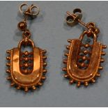 A pair of Victorian 9ct rose gold pendant earrings, bearing registration kite marks for 1879, on