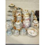 Twenty-eight pieces of Brownhills pottery decorated with bamboo and trellis, including teapots,