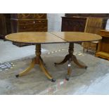 A reproduction mahogany twin-pillar dining table with two leaves, 170 x 101cm closed, 271 x 101cm