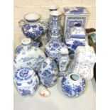 A collection of modern blue and white Oriental ceramics, including vases, spice drawers, etc.