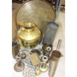 A large brass jug, 34cm high, a brass Benares tray, 59cm diameter, a copper slipper warmer and other