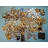 A large quantity of modern costume jewellery, some in unopened packets.