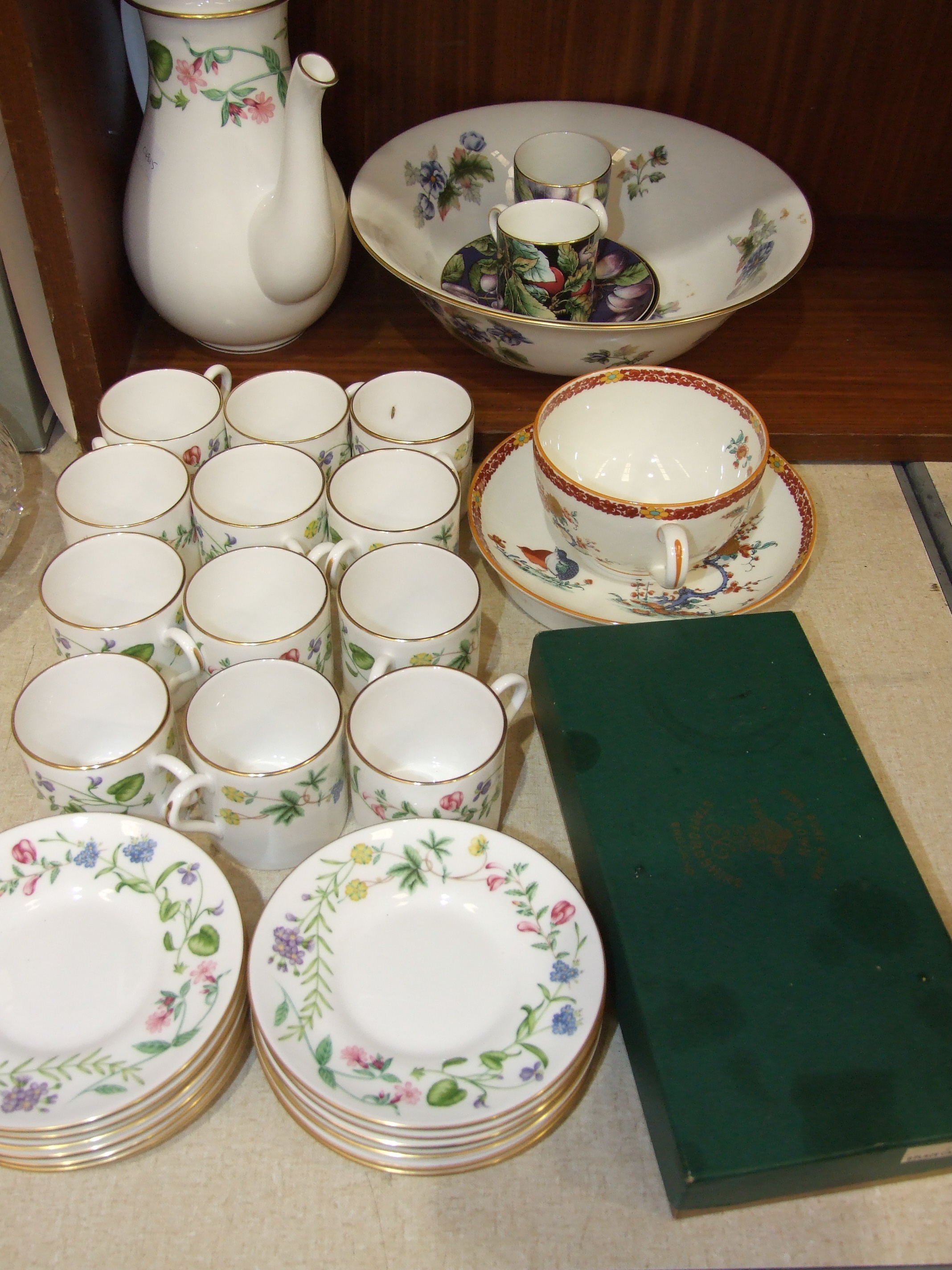 A Royal Worcester 'Arcadia' coffee pot, twelve coffee cups and saucers, a Royal Worcester '