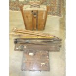 A collection of artist's easels, a travelling easel and paint box and other artist's materials.