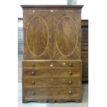 A late Victorian mahogany linen press, the cornice above a pair of doors and four graduated drawers,