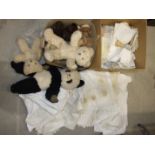 A quantity of table linen, soft toys and other items.