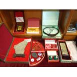 A collection of Chinese and Oriental gift items, including a painted and wood miniature four-fold