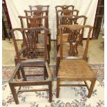 Four Georgian elm and oak country dining chairs with solid seats, on square chamfered supports and