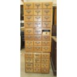 Three oak banks of twelve file card drawers, 51 x 47cm, (3).