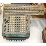 A vintage Madas adding machine, an iron book press, an Ayers Jardine Ltd Showcard ten-eight printing