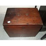 A mahogany box with hinged lid, (handle lacking) and fitted with brass military-style side