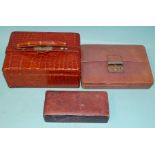 A vintage crocodile-style leather jewellery case with fitted velvet and leather interior, (silk